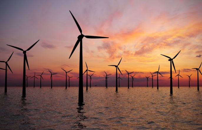 offshore-wind-farm-at-sunset-768x493