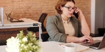 Interviewer talks on the phone.